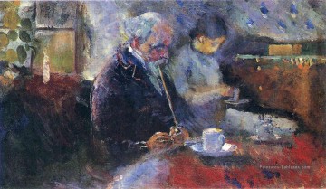 à la table basse 1883 Edvard Munch Peinture à l'huile